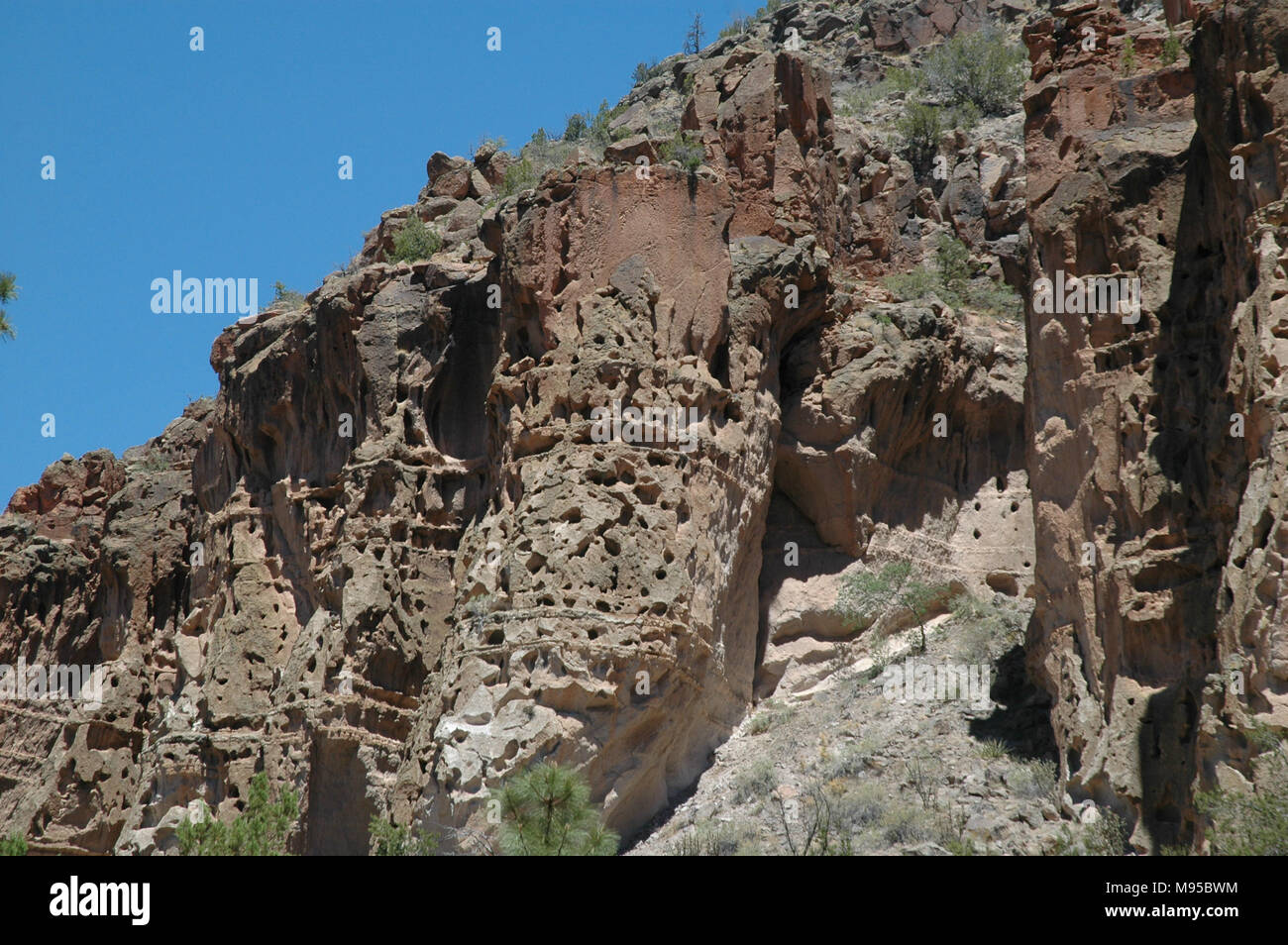 The Alcove Trail in the Bandelier National Monument exhibits examples of Volcanic Tuff rock. Stock Photo