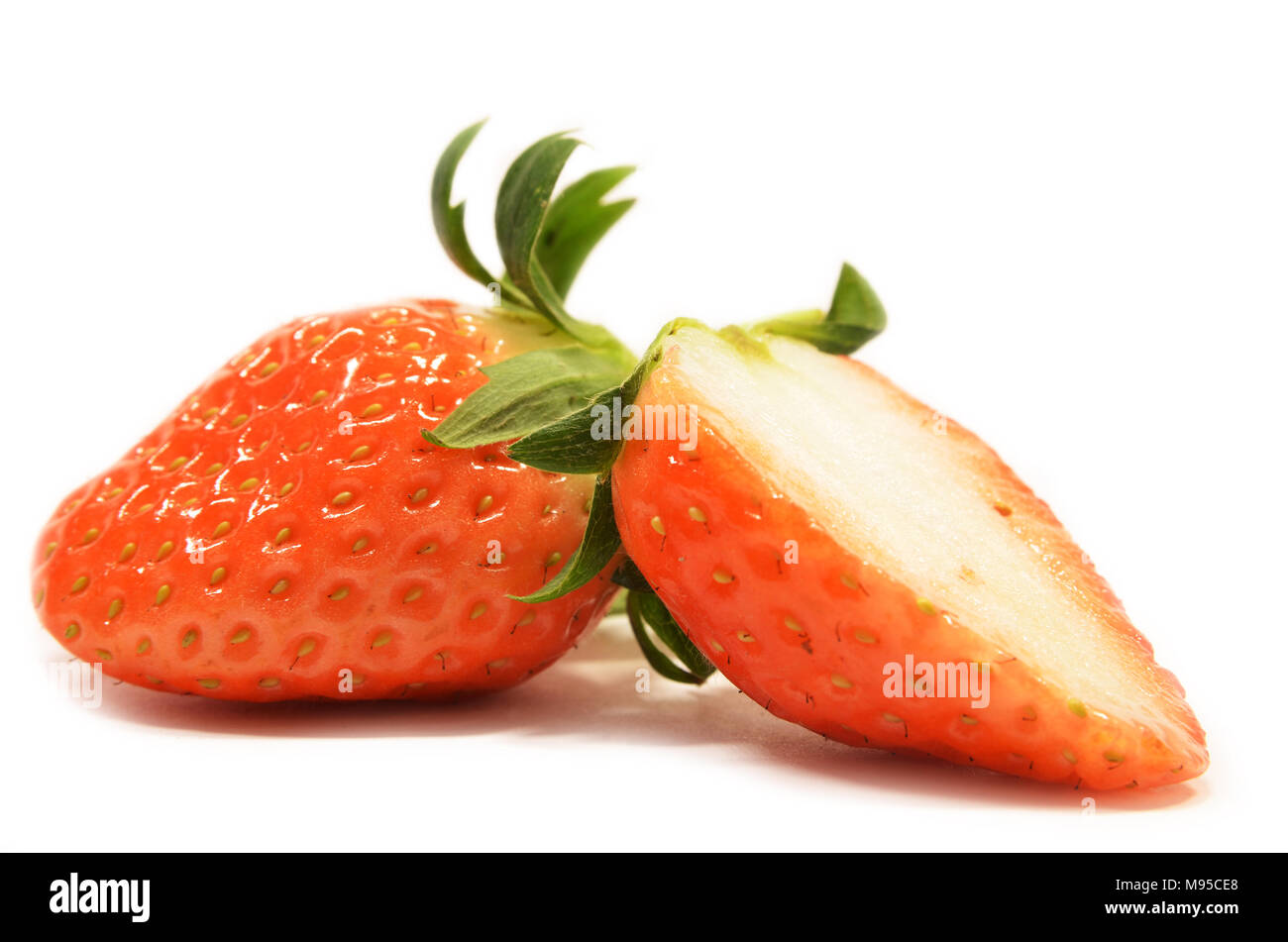 Strawberry fruits isolated on a white background Stock Photo - Alamy