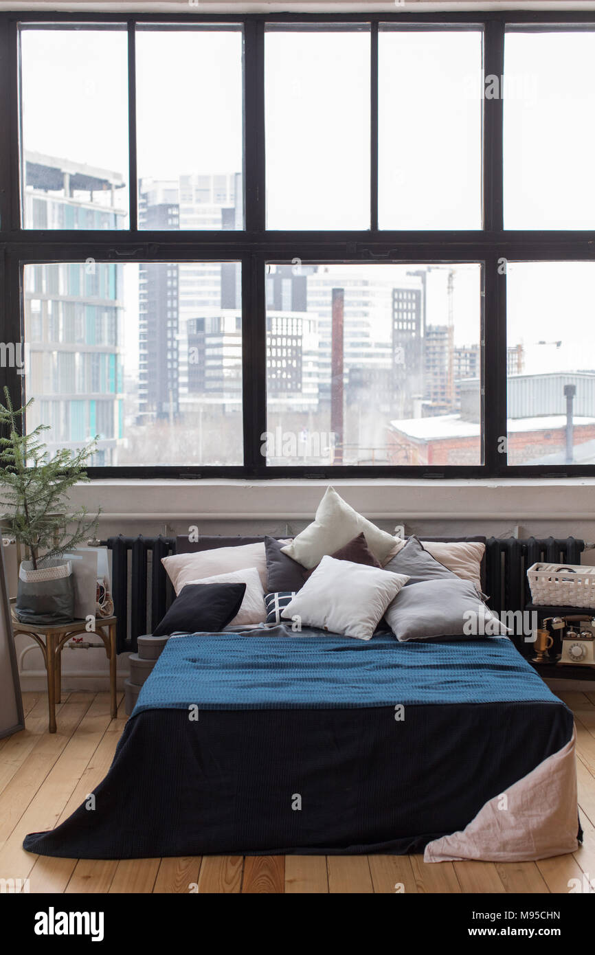 View of Bedroom design with city view Stock Photo - Alamy