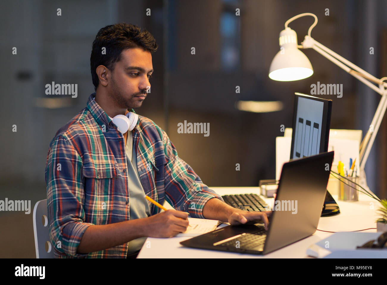 Creative man laptop working night hi-res stock photography and images ...