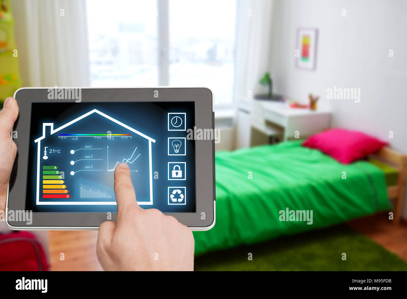 tablet pc with smart home settings on screen Stock Photo