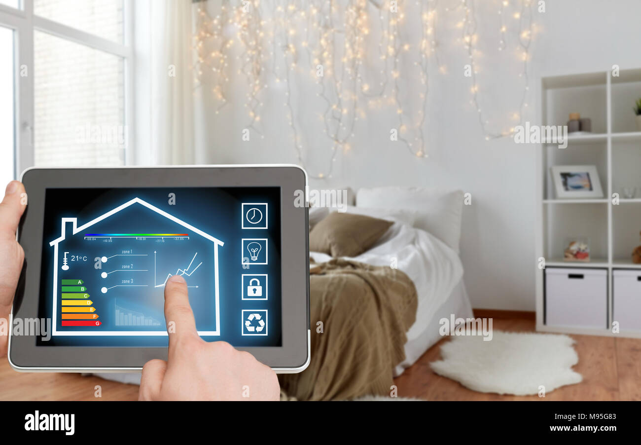 tablet pc with smart home settings on screen Stock Photo