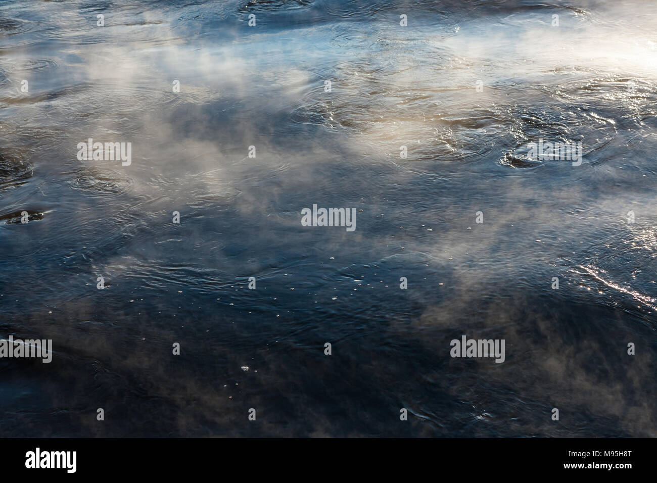 Water vapor on surface of cold water Stock Photo