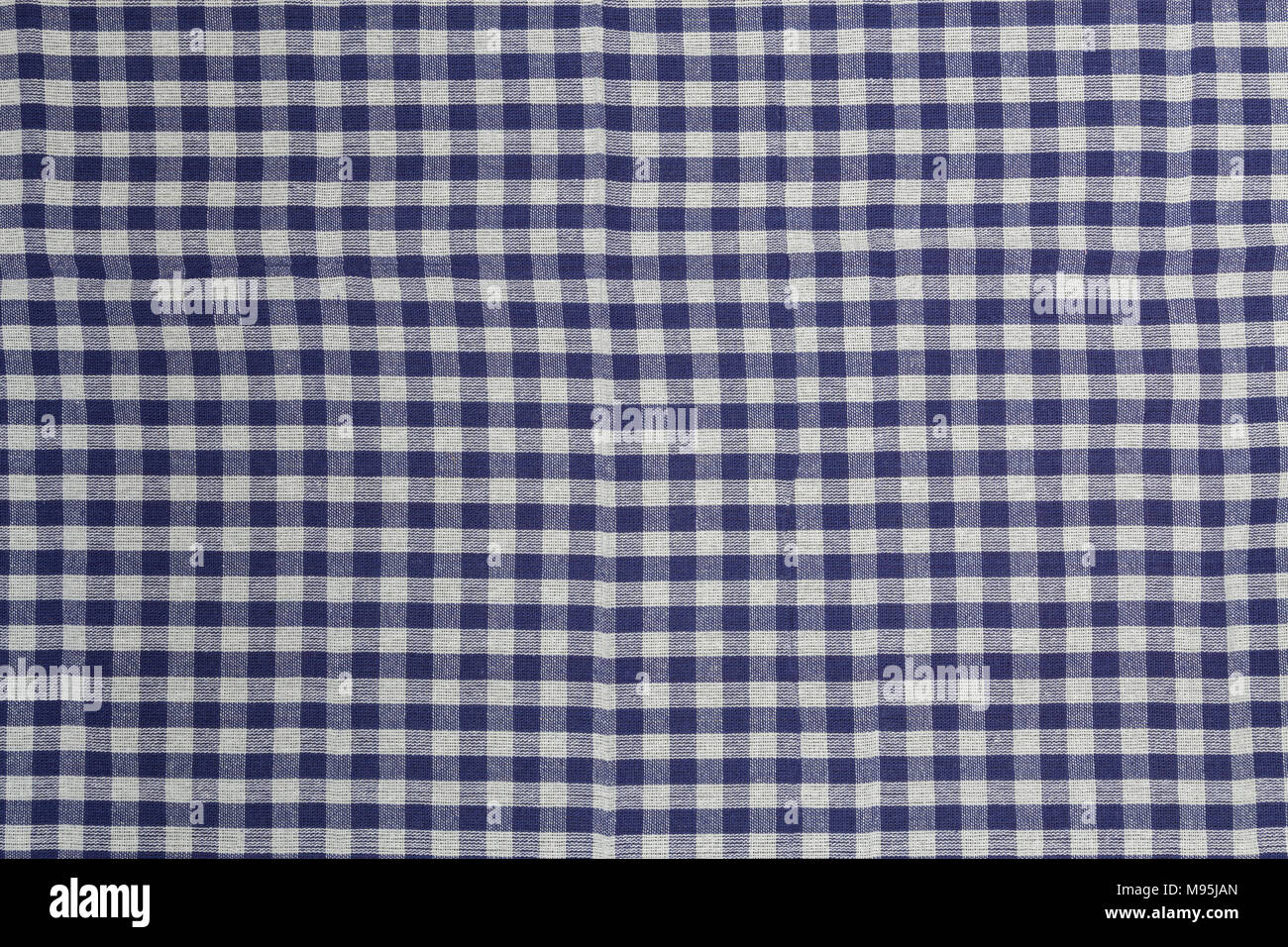 Blue white checked kitchen towel background structure. Stock Photo