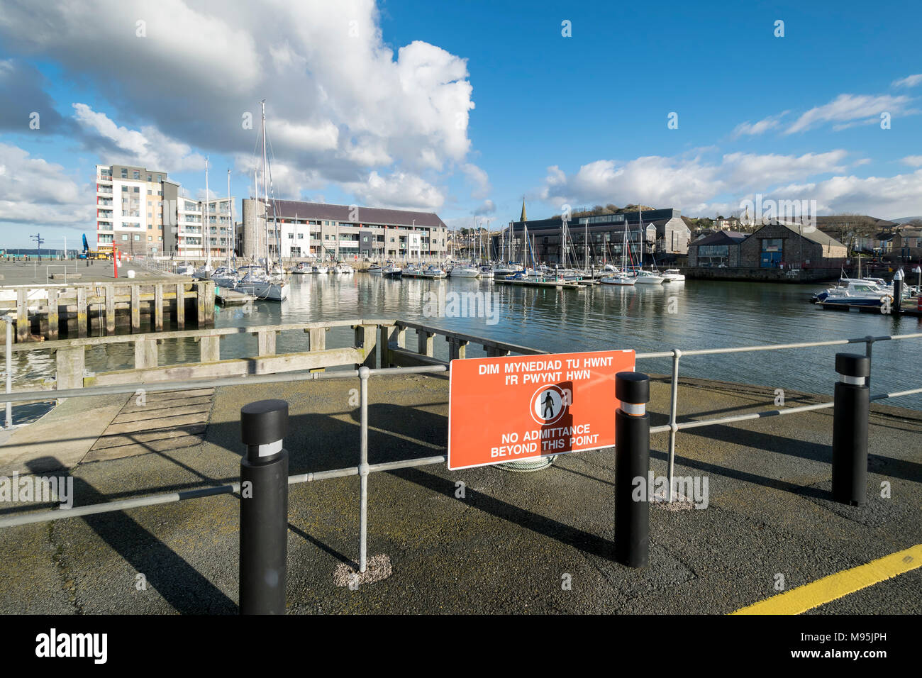 Caernarfon docks or yacht marina on the Menai strait in North Wales UK