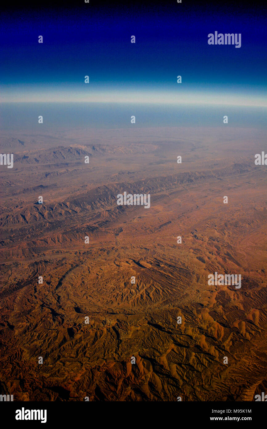 An aerial view from 37,000 feet of an extinct volcano in the middle a ...