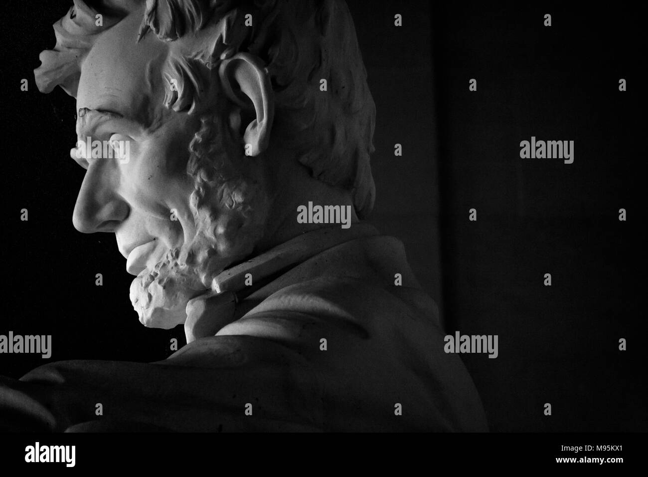 Light plays beautiful on a close up of the head of the statue of Abraham Lincoln in the Lincoln memorial, Washington DC, USA. Stock Photo