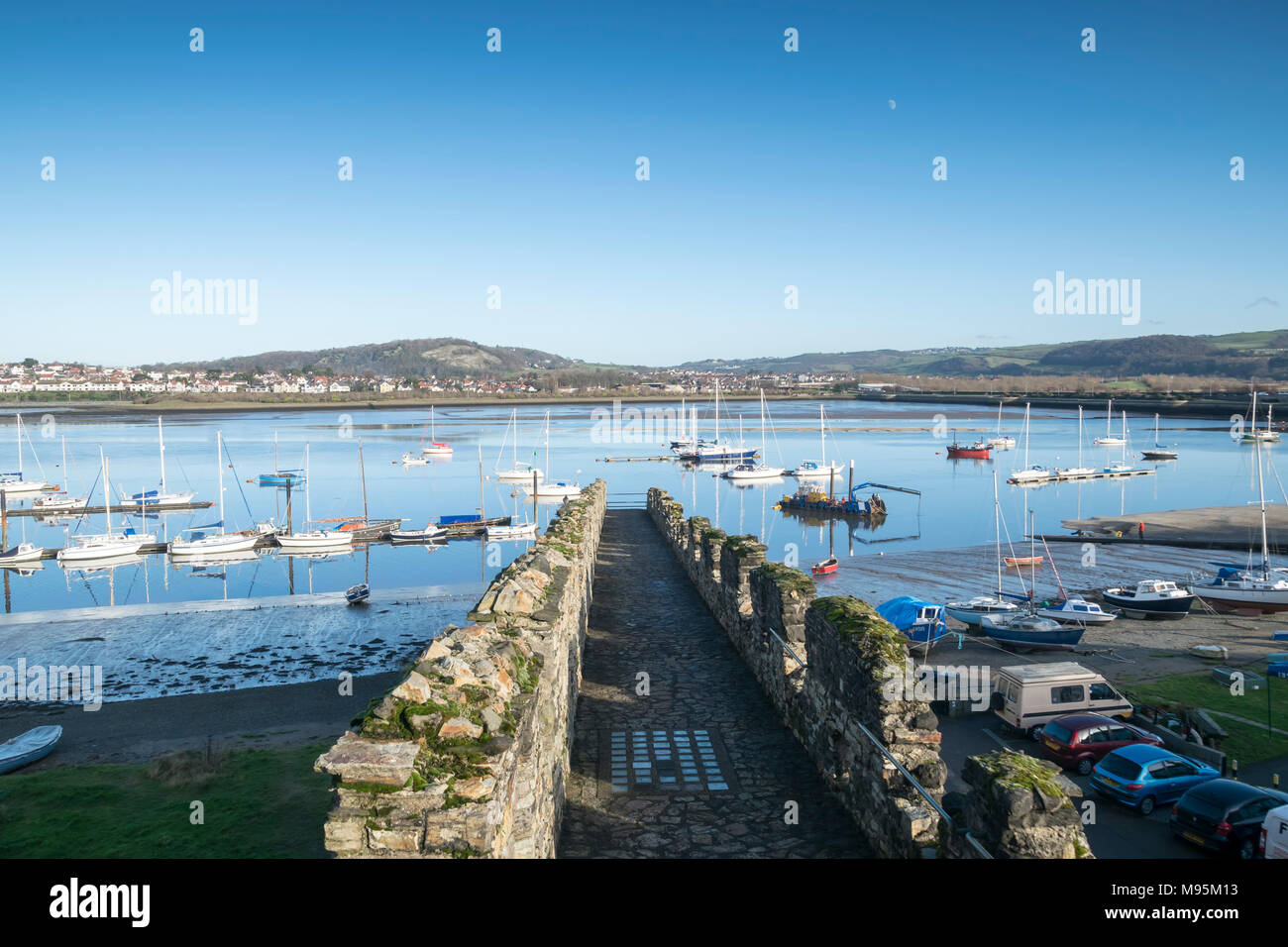 Conwy Castle outer wall and river estuary in North Wales uk Stock Photo