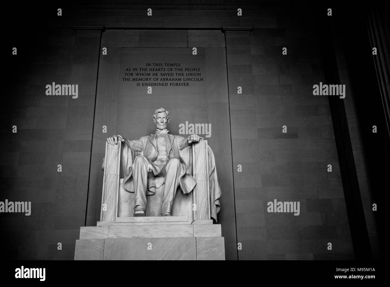 Light begins to fall inside Lincoln´s memorial building as the statue receives the last rays of the day, Washington DC, USA Stock Photo