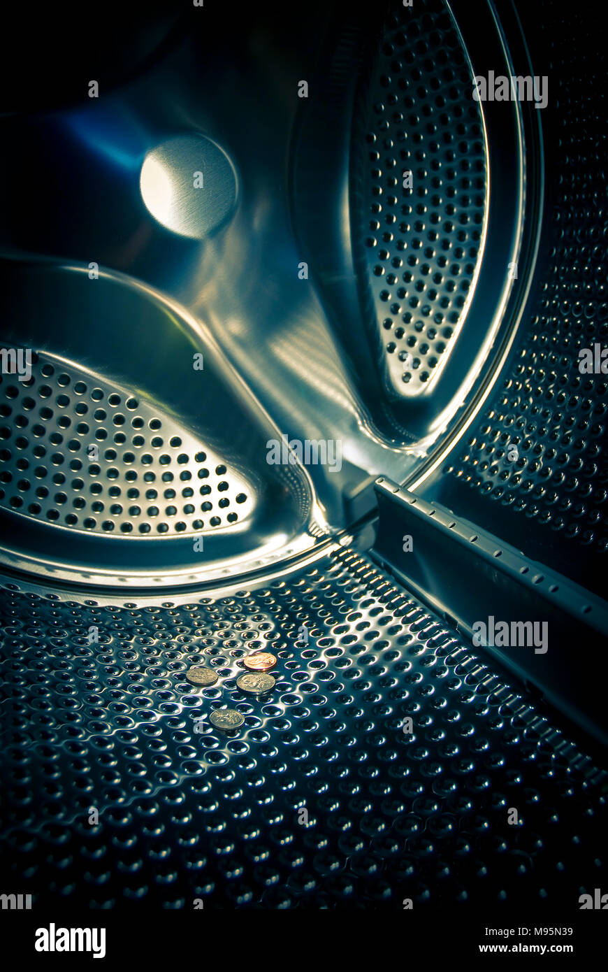 Lost Coins In Washer Stock Photo Alamy