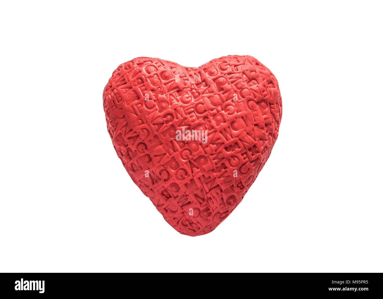 Red heart with imprinted letters isolated on white background Stock Photo
