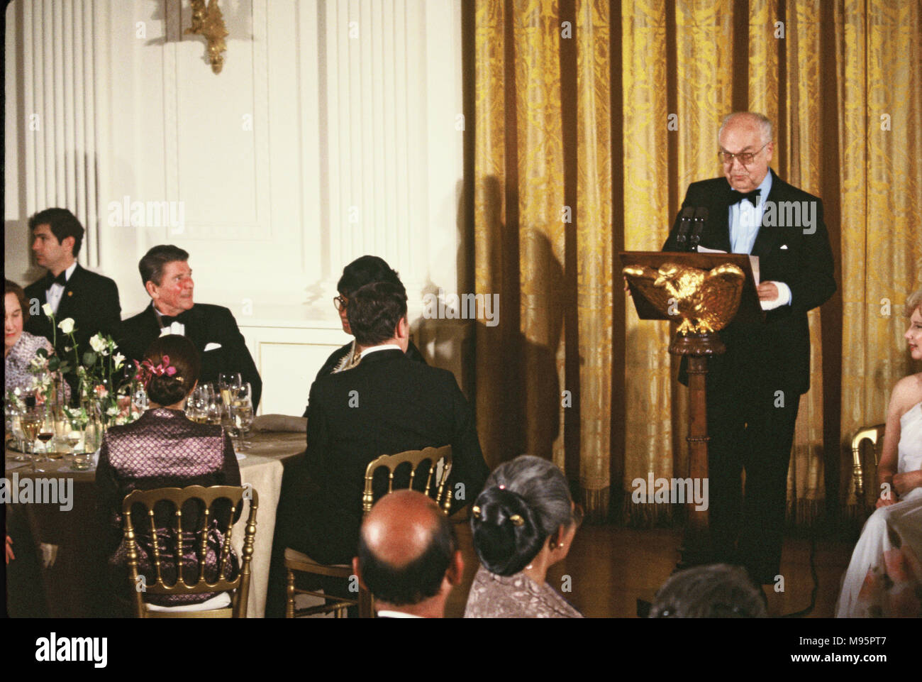 President Roanld Reagan listens to Ambassador Anatoly Dobrynin, Dean of the diplomatic corps, at a State Dinner for the Diplomatic Corps in the State Dining Room of the White House on February 19, 1982   Photograph by Dennis Brack Stock Photo
