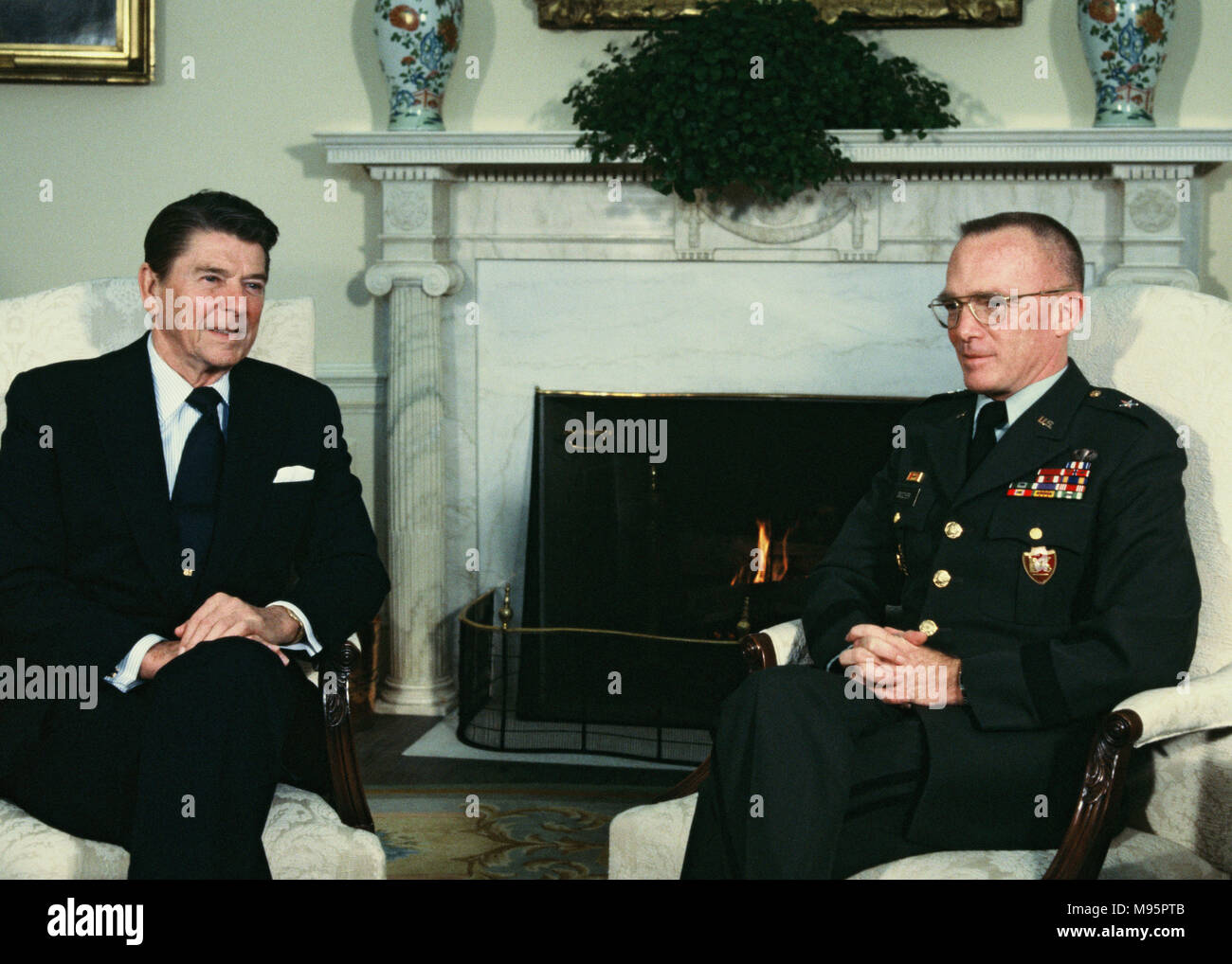 President Ronald Reagan and  Gen. James L. Dozier, who had been held captive for 42 days by Red Brigades terrorists on February 4, 1982.  Photograph by Dennis Brack Stock Photo