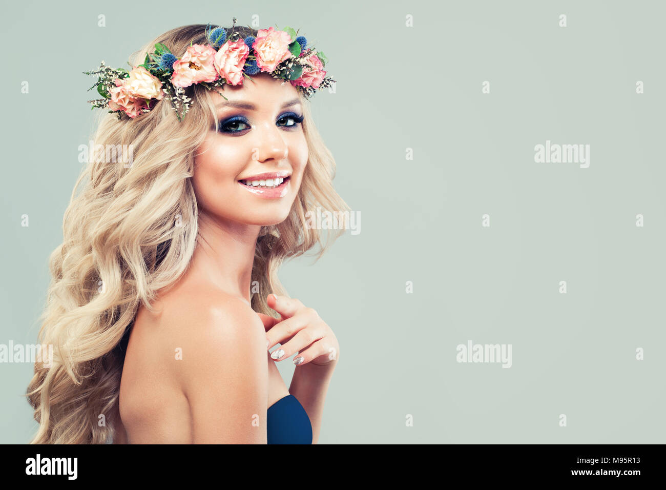 Spring Woman With Blonde Curly Hair And Rose Flowers And Green