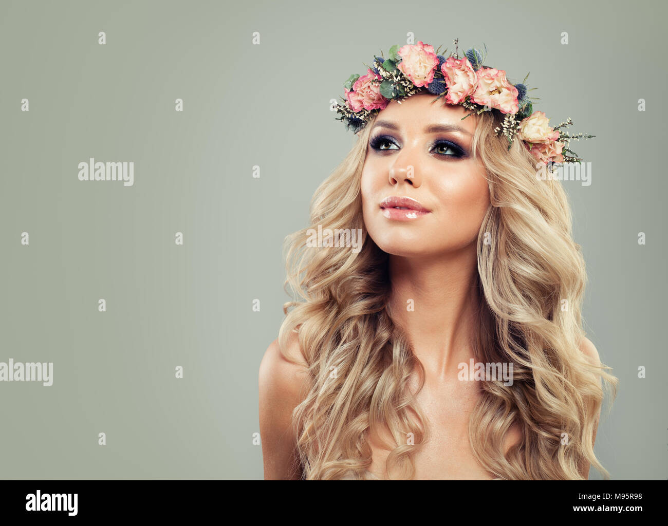 Young Woman With Flowers Hairstyle Blonde Beauty Fashion Model