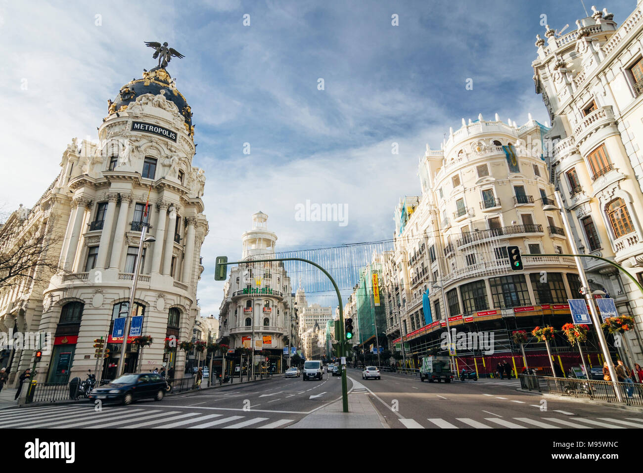 Madrid, Spain : Gran Via main thoroughfare and Metropolis Building. Inaugurated in 1911, it was designed by Jules and Raymond Février Stock Photo