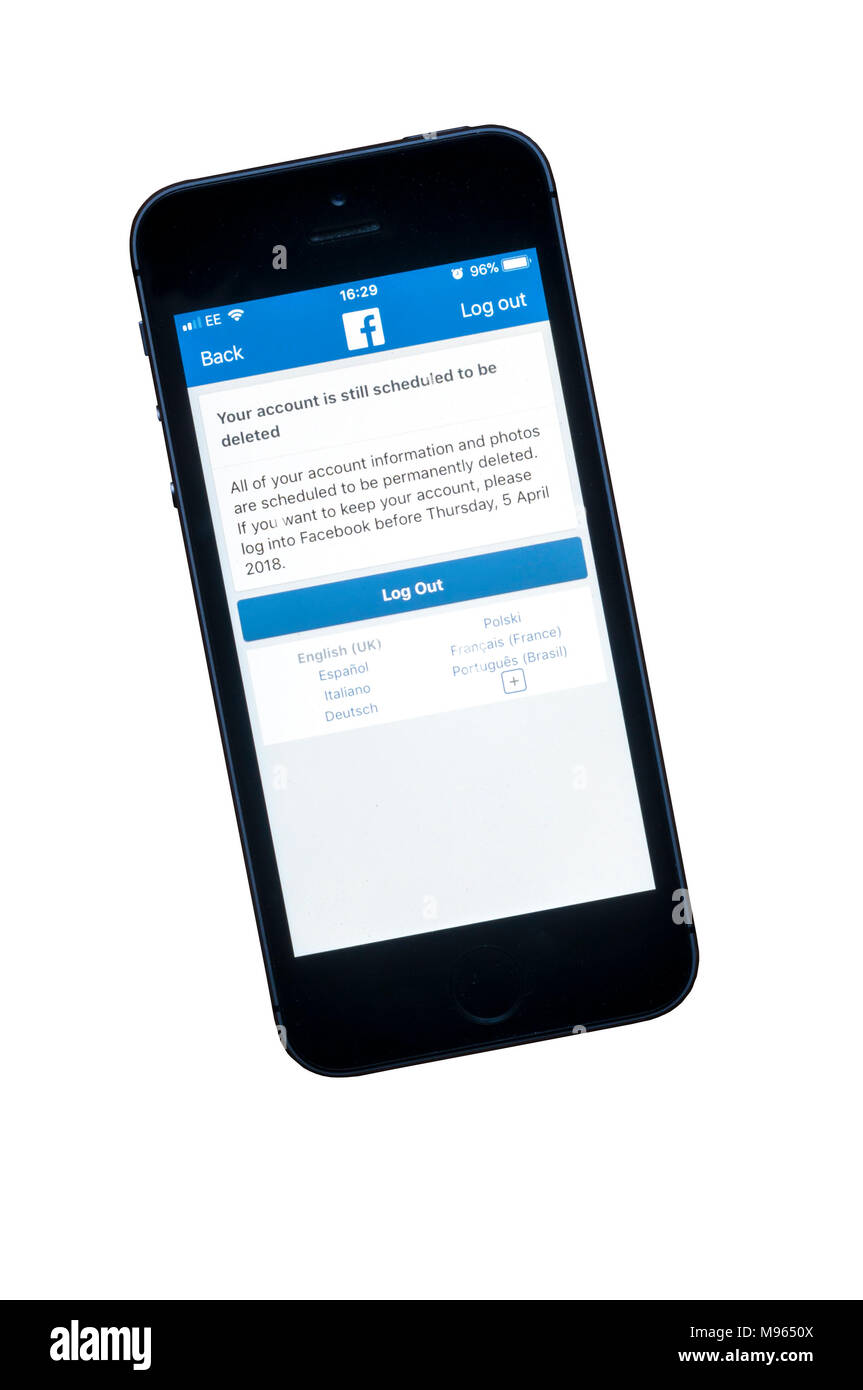 Screens showing permanent deletion of a facebook account on an iphone 6. Stock Photo