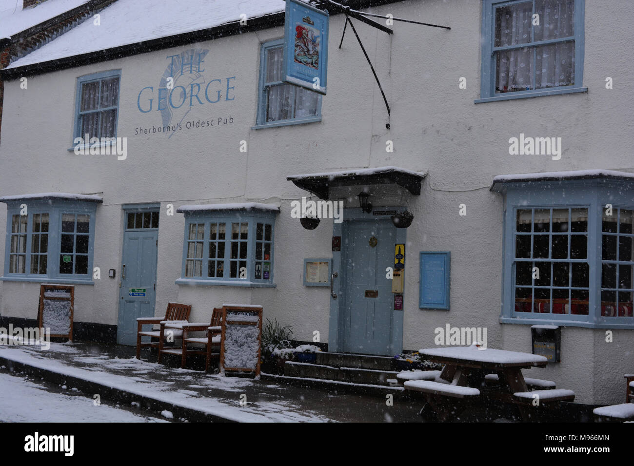 The George in the historic market town If Sherborne, Dorset during the so-called mini Beast from the East snowstorm, March 2018. Stock Photo