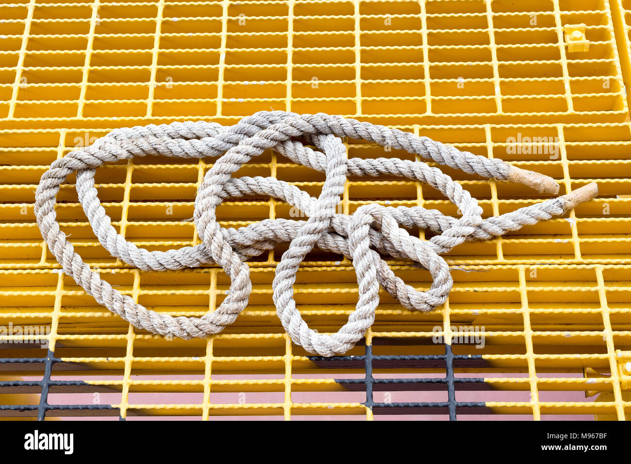 White wavy rope isolated on white. Seamless pattern. Stock Photo