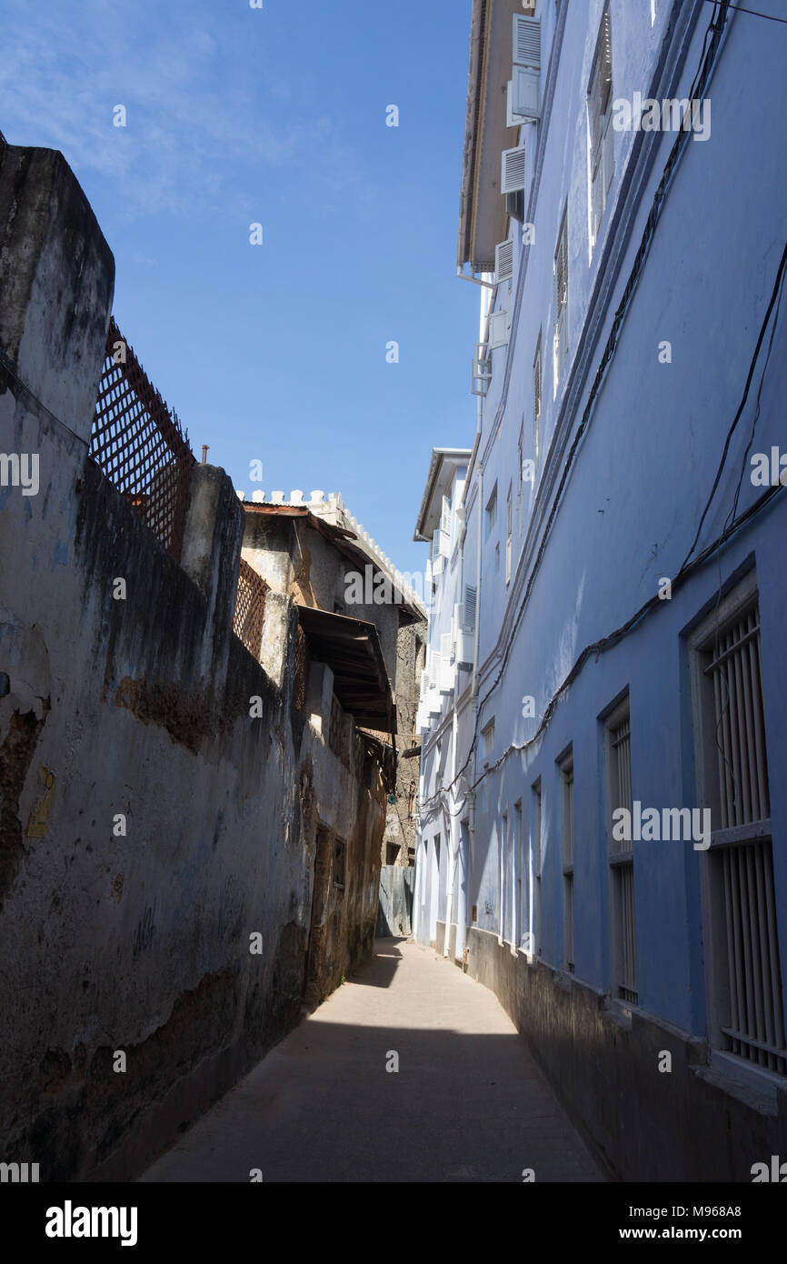 Traditional narrow street in Stone Town, Zanzibar Stock Photo