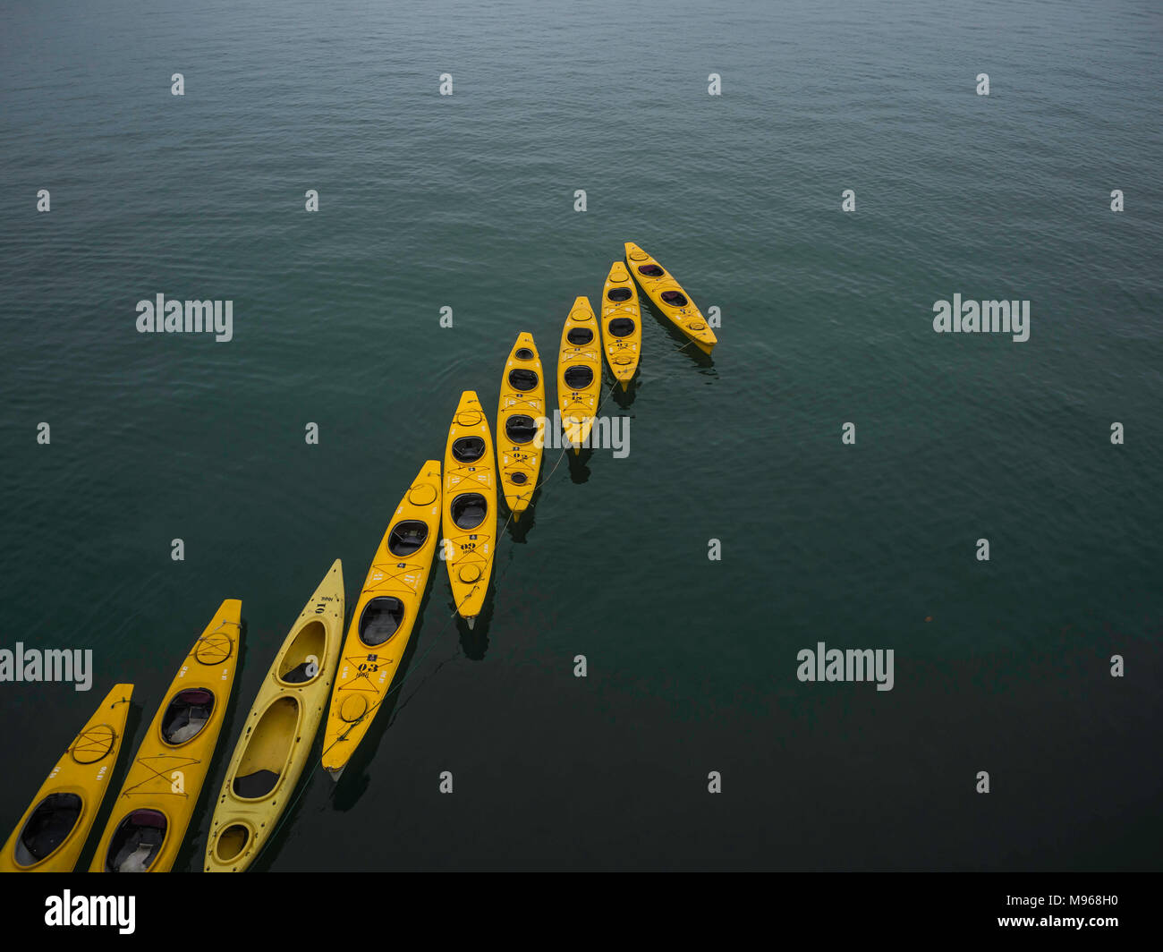 Yellow kayaks on Halong bay Stock Photo