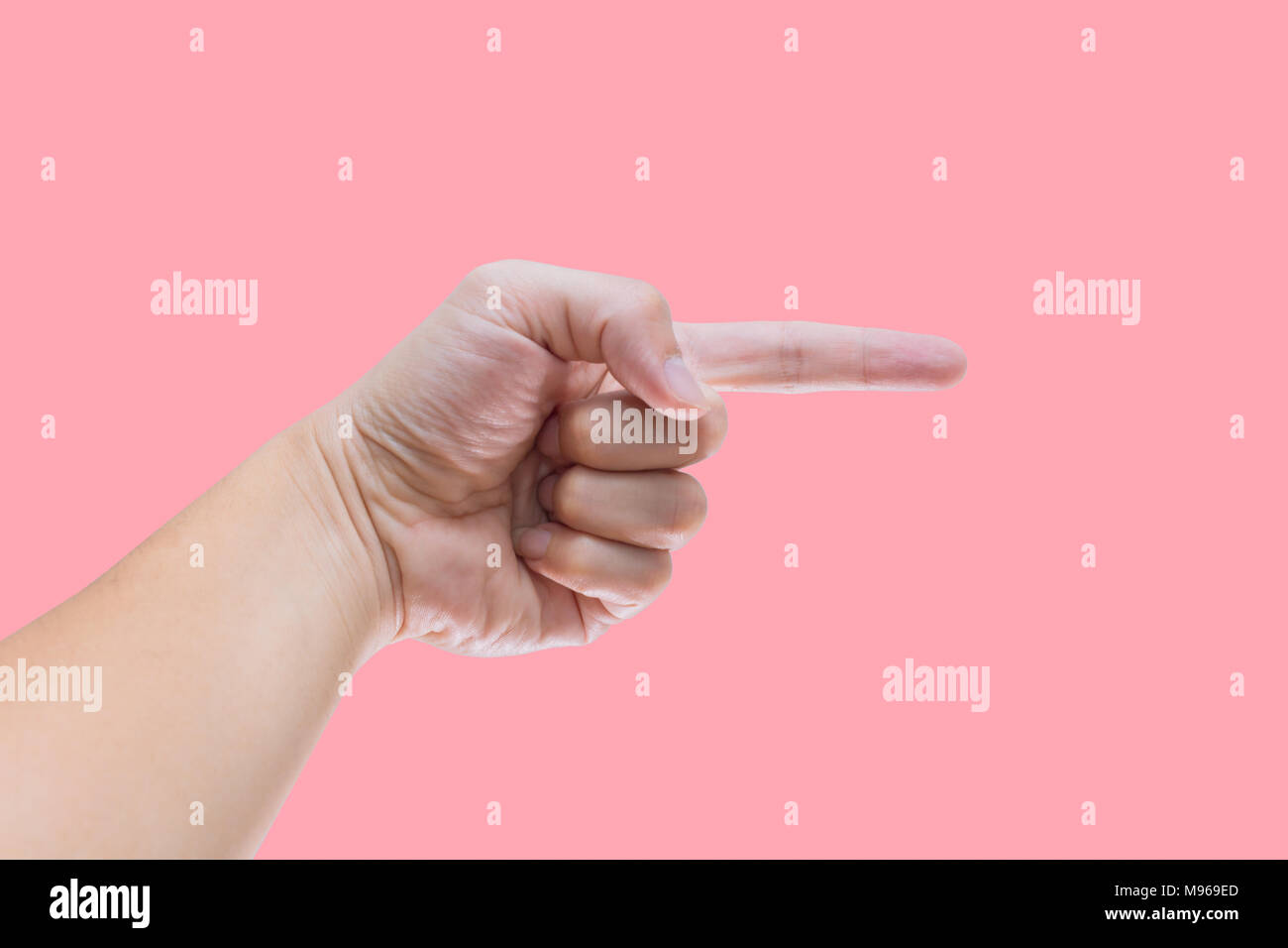 Hand finger guide pointing isolated on pink color background Stock Photo
