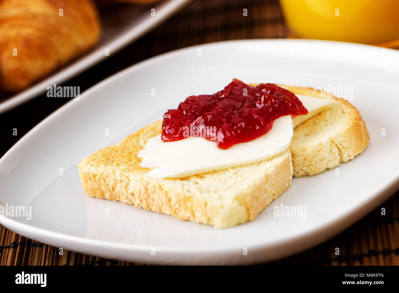 Strawberry Jam on Toast Stock Photo Alamy
