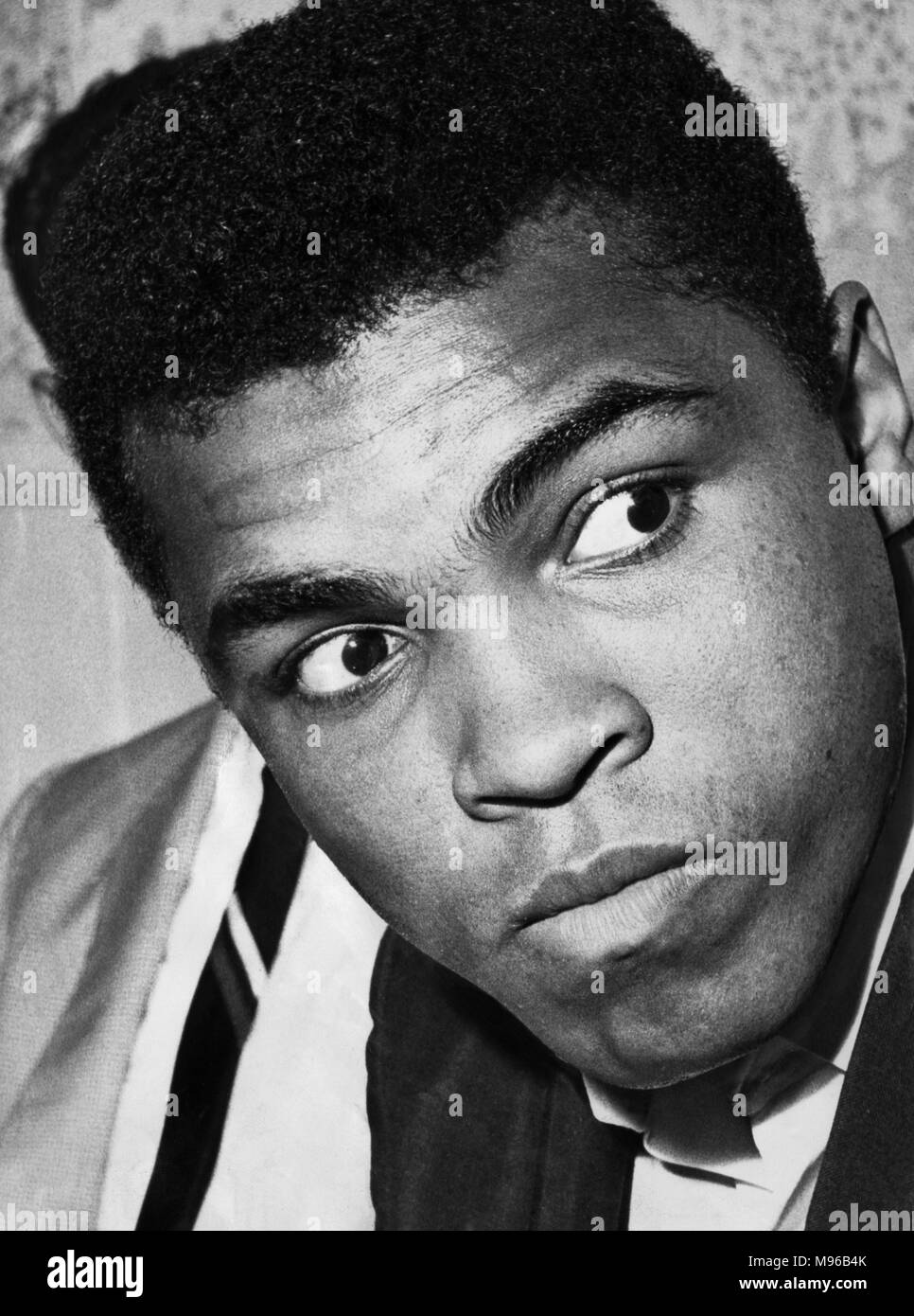 Muhammad Ali born Cassius Marcellus Clay Jr. January 17, 1942 June 3, 2016 was an American professional boxer and activist. He is widely regarded as one of the most significant and celebrated sports figures of the 20th century. From early in his career, Ali was known as an inspiring, controversial, and polarizing figure both inside and outside the ring. (Picture) Clay shortly after arriving in Glasgow. 18th August 1965 Stock Photo