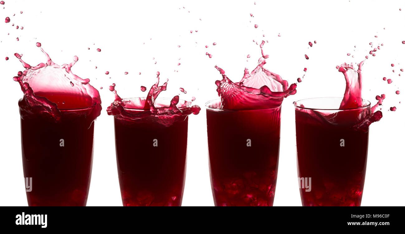 Sequence of splashes on raspberry juice against a white background Stock Photo