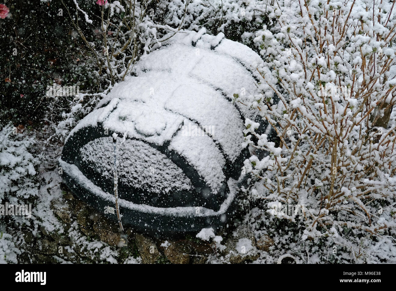 A domestic oil tank covered in snow Stock Photo