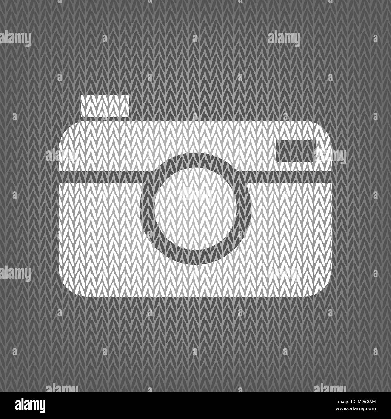 Digital photo camera sign. Vector. White knitted icon on gray knitted background. Isolated. Stock Vector