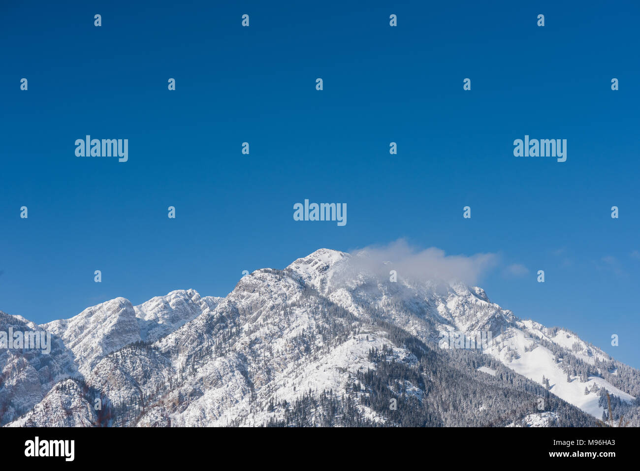 Snow capped mountains during winter Stock Photo