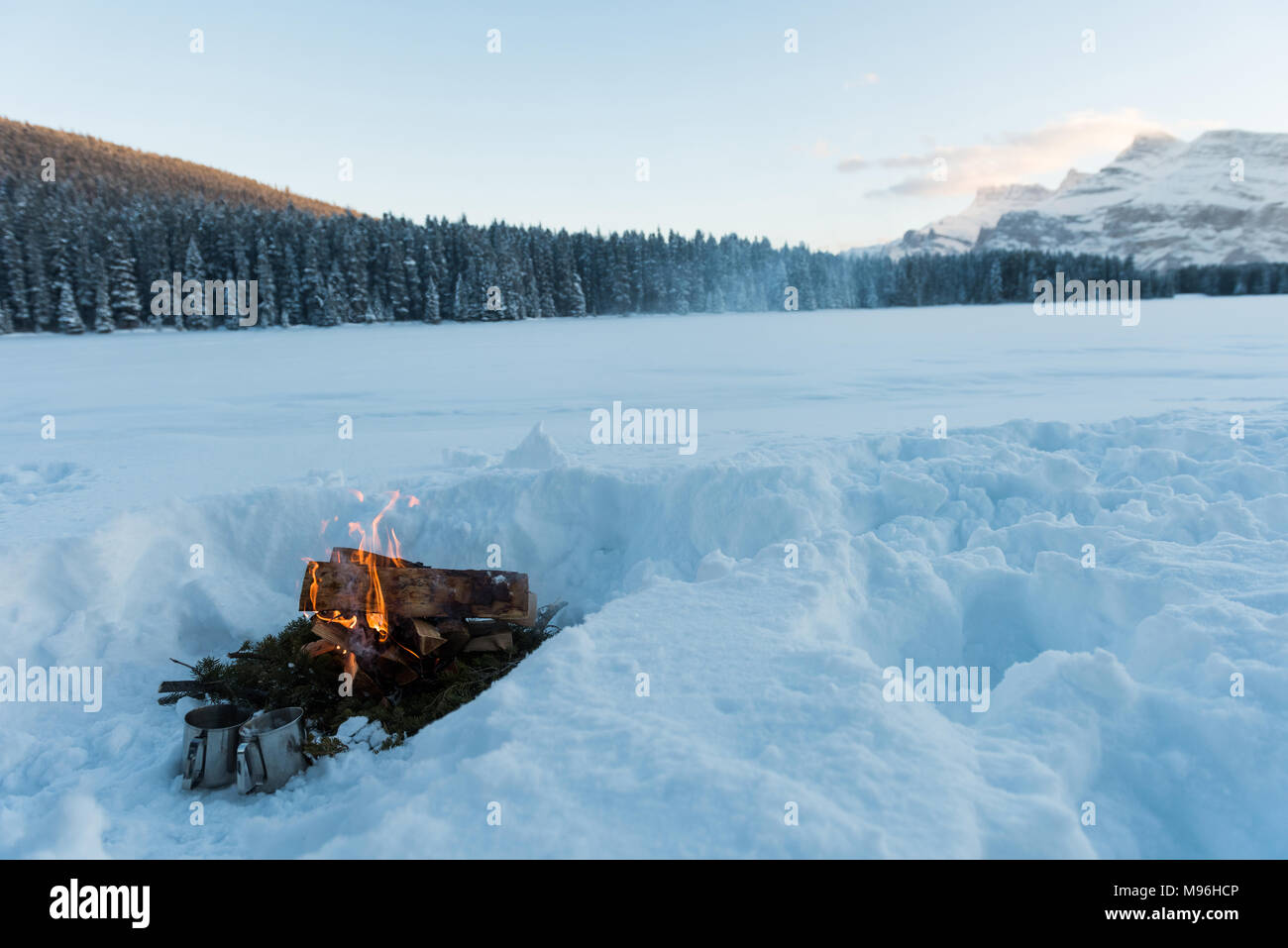 Bonfire in snowy landscape Stock Photo