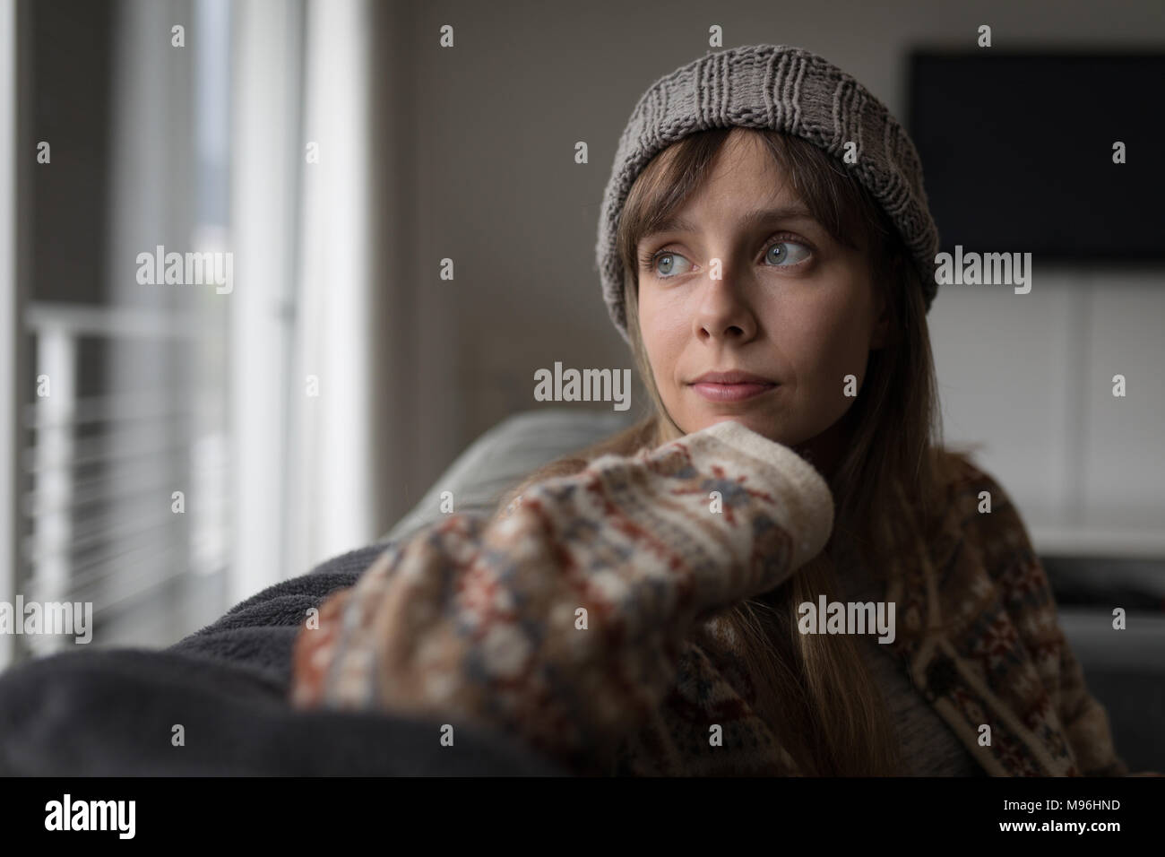 Woman in woolly hat hi-res stock photography and images - Alamy