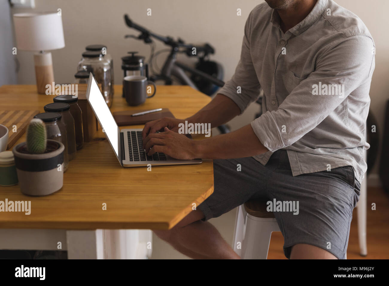 Man using laptop at home Stock Photo