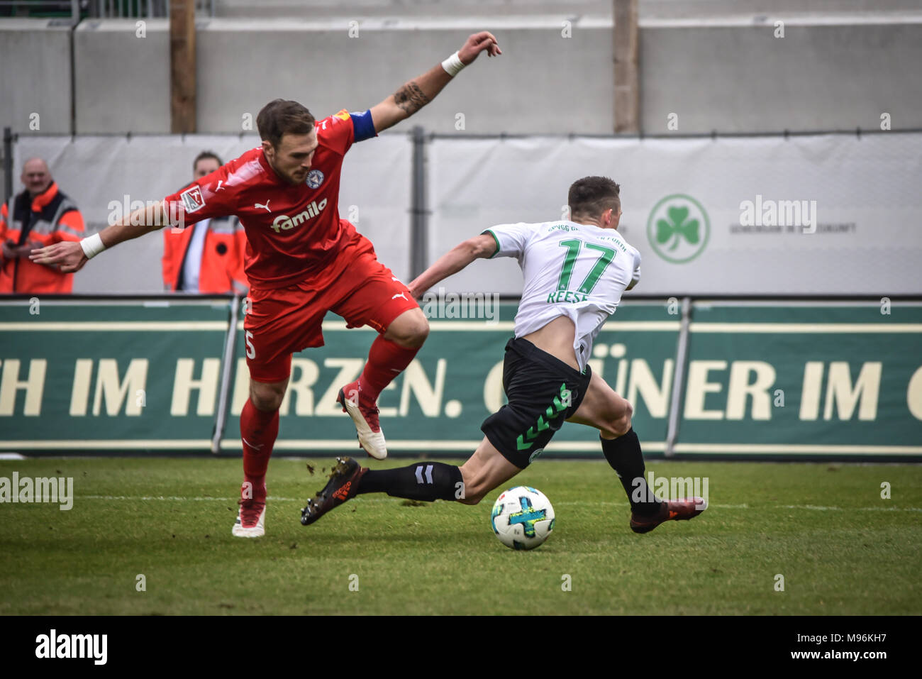 Gr.FŸrth vs. Holstein Kiel - 2.Bundesliga - Image: v. lk. Richard Magyar (SpVgg Gr. Fuerth, #5) against Fabian Reese (SpVgg Gr. Fuerth, #17). Stock Photo