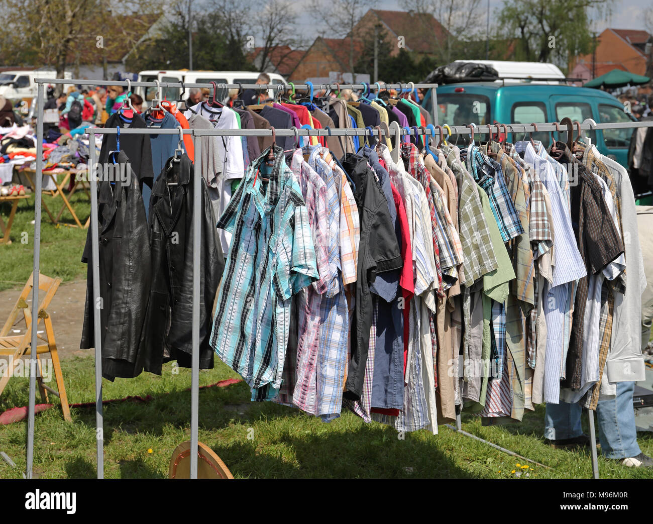 Rails With Second Hand Clothes at Flea Market Stock Photo Alamy