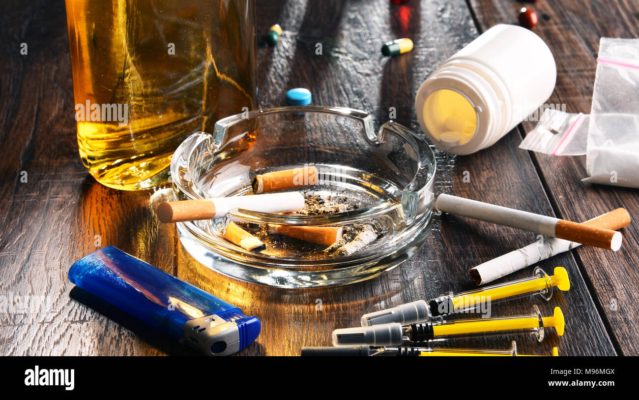 Addictive substances, including alcohol, cigarettes and drugs. Stock Photo