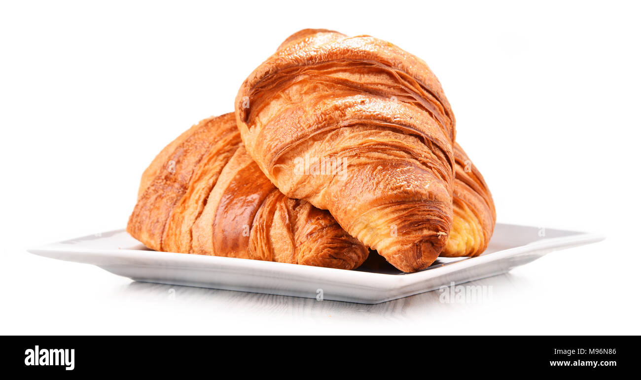 Composition with croissants isolated on white background Stock Photo