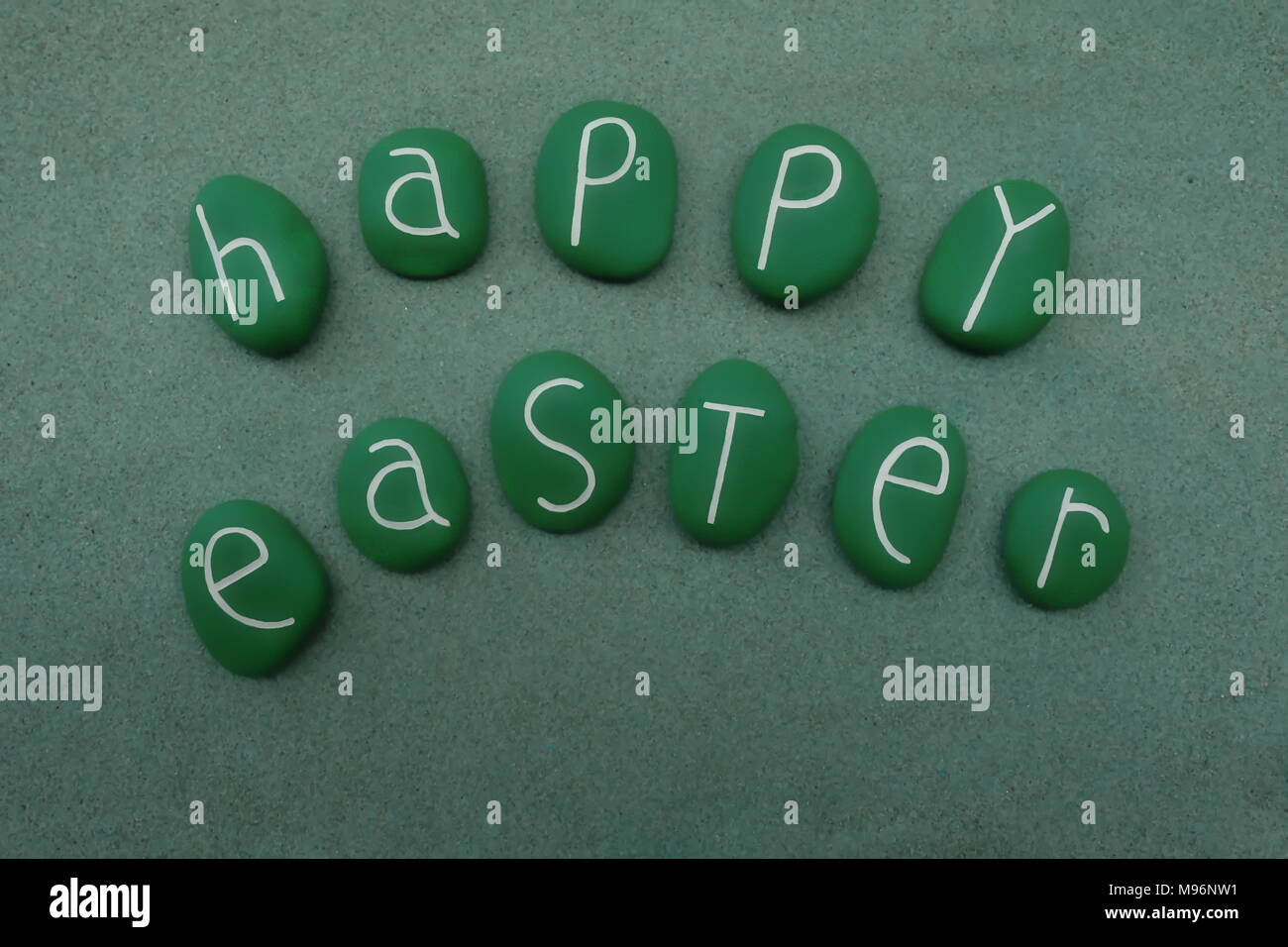 Happy Easter with green colored stones Stock Photo