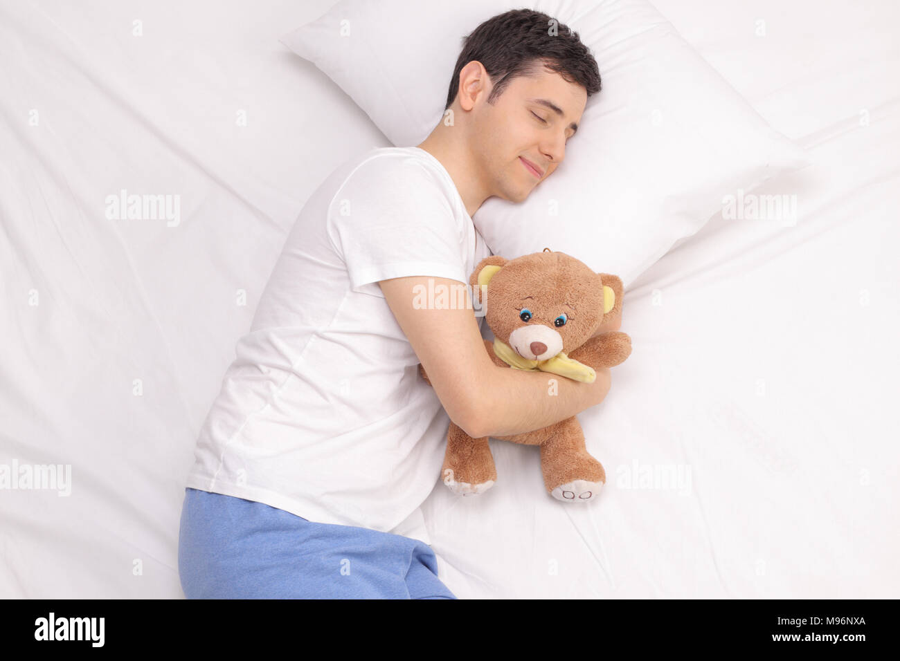 sleeping with teddy bear