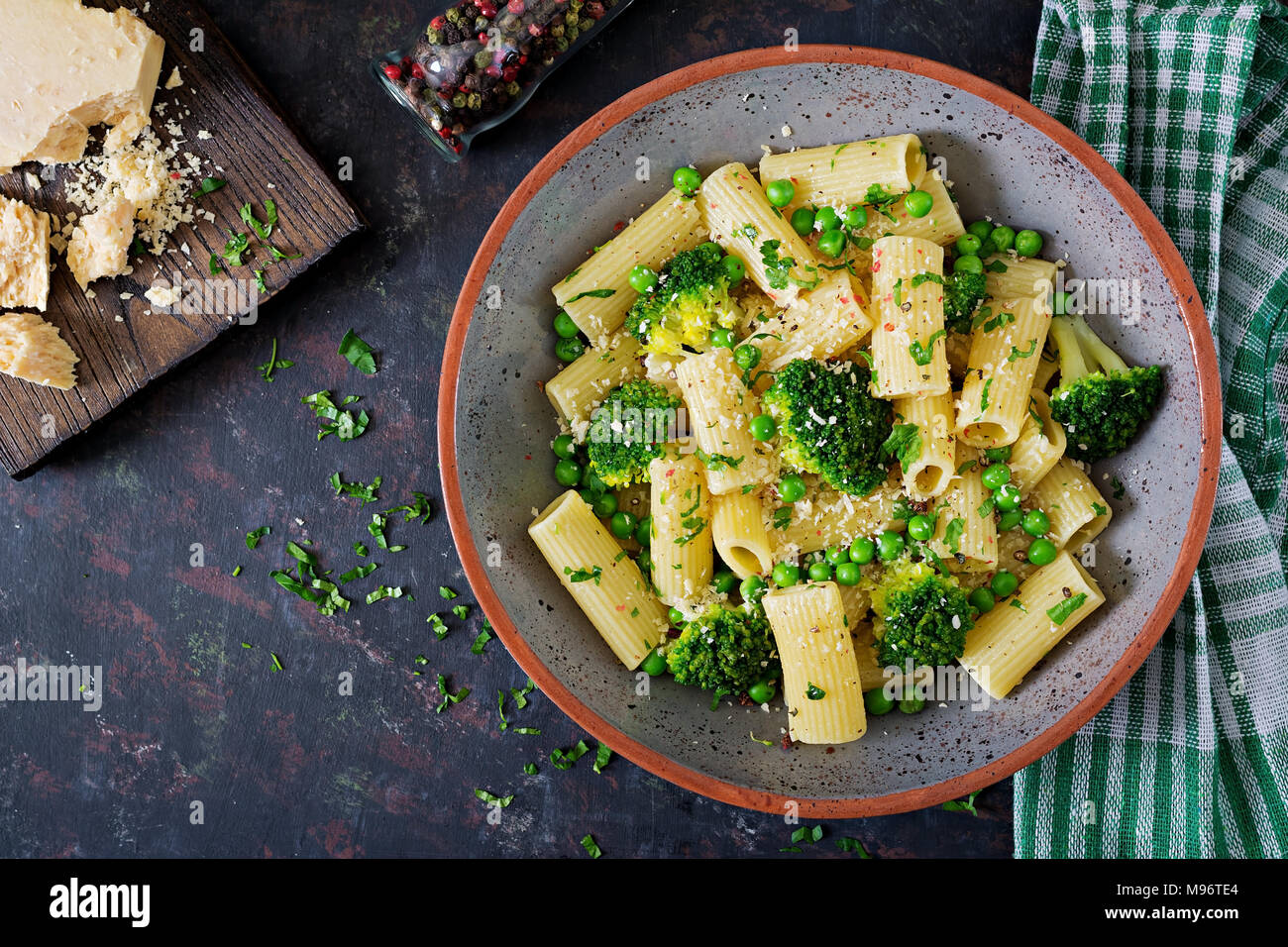 Pasta rigatoni with broccoli and green peas. Vegan menu. Dietary food ...