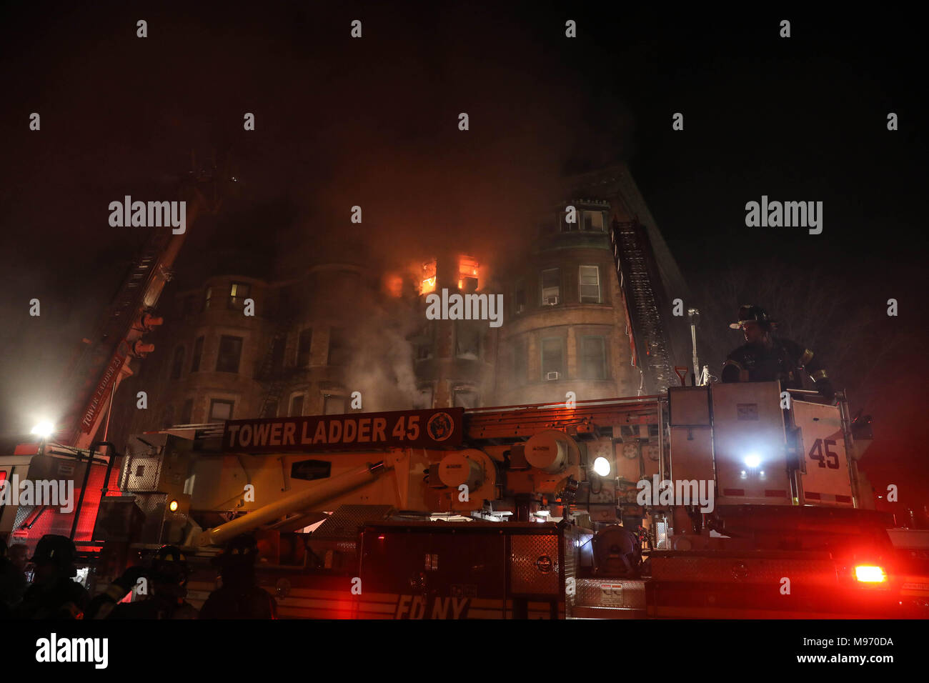 New York, New York, USA. 23nd Mar, 2018. A fire struck the basement of a building where it was a movie set from Motherless Brooklyn's film director Edward Norton at 401 St. Nicholas Avenue in Hamilton Heights on Manhattan Island in New York City early in the morning of this Friday, 23. No information of injuries. Credit: William Volcov/ZUMA Wire/Alamy Live News Stock Photo