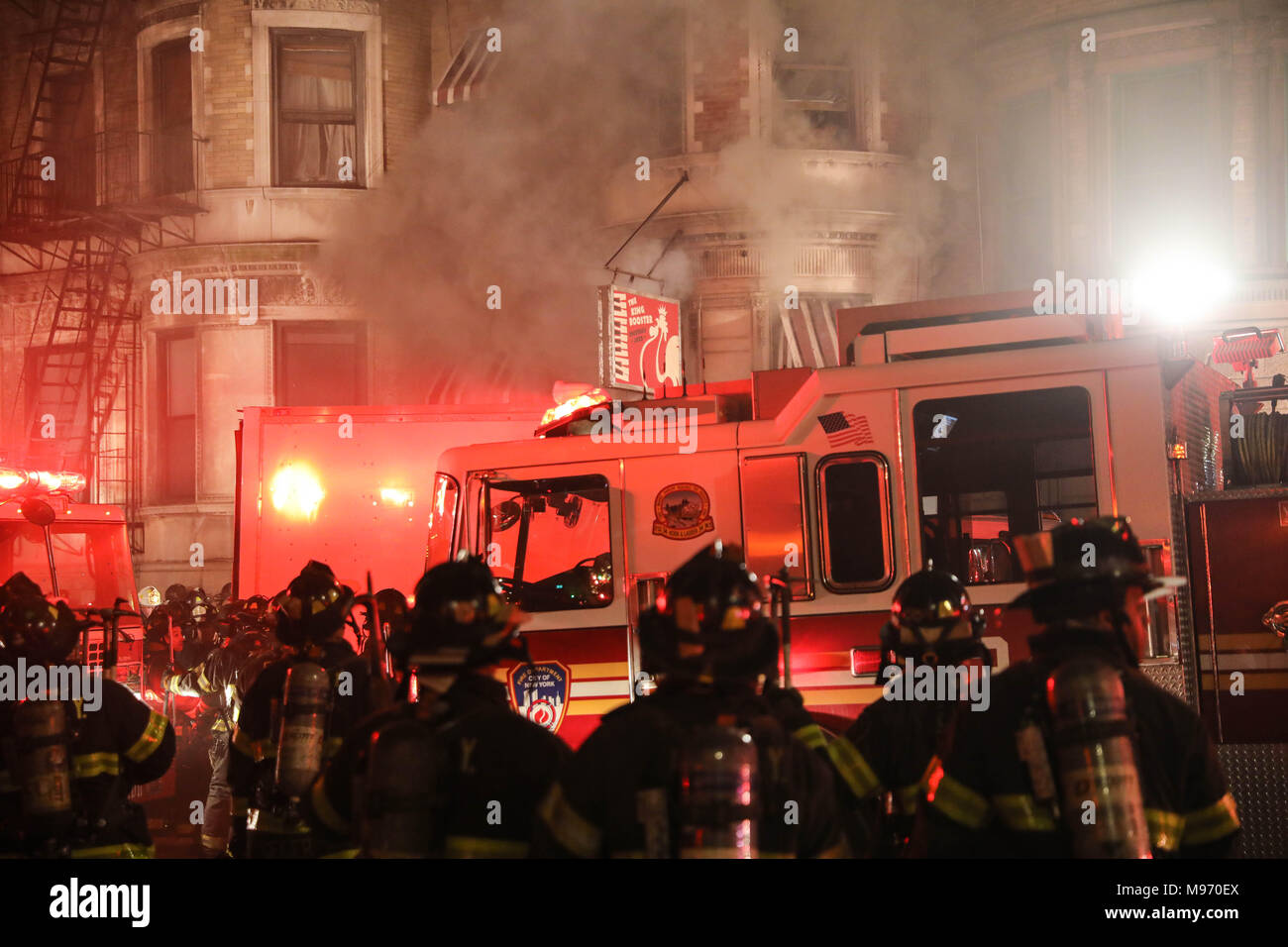New York, New York, USA. 23nd Mar, 2018. A fire struck the basement of a building where it was a movie set from Motherless Brooklyn's film director Edward Norton at 401 St. Nicholas Avenue in Hamilton Heights on Manhattan Island in New York City early in the morning of this Friday, 23. No information of injuries. Credit: William Volcov/ZUMA Wire/Alamy Live News Stock Photo