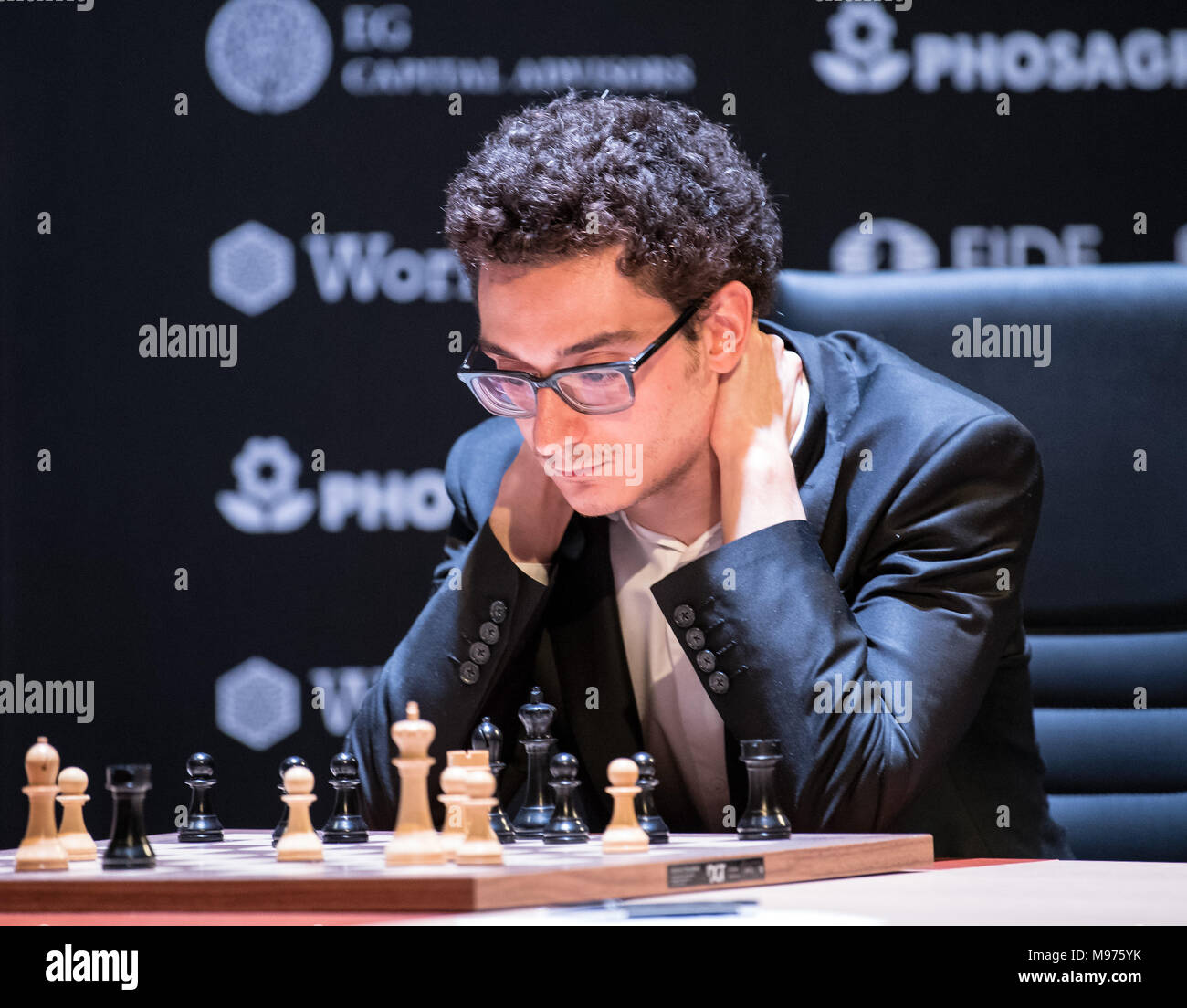 22 March 2018, Germany, Berlin: Italian-American chess champion Fabiano  Caruana competes against Shakhriyar Mamedyarov (not shown), a chess  champion from Azerbaijan, at this year's FIDE World Chess Candidates  Tournament at the Kuehlhaus