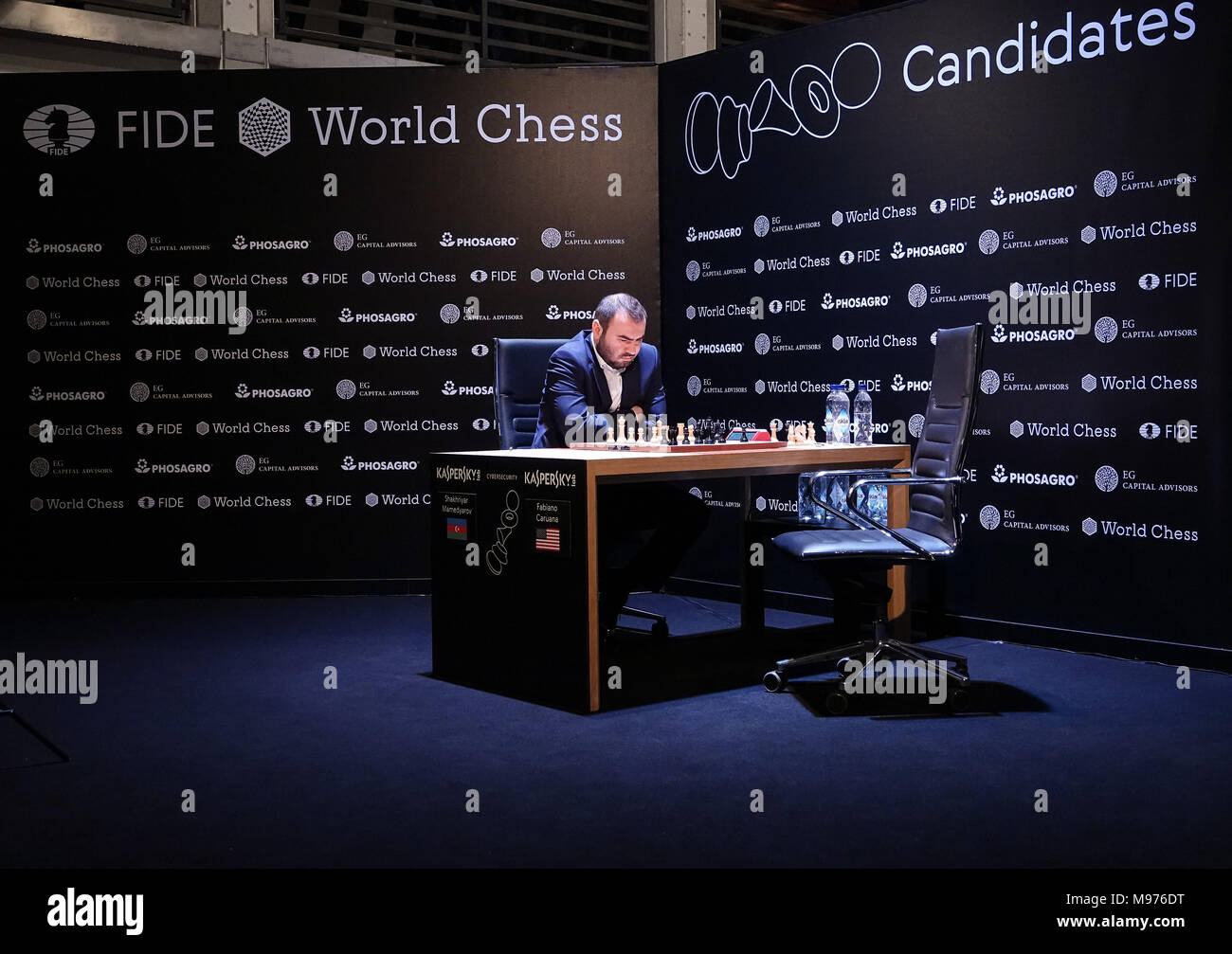 22 March 2018, Germany, Berlin: Italian-American chess champion Fabiano  Caruana competes against Shakhriyar Mamedyarov (not shown), a chess  champion from Azerbaijan, at this year's FIDE World Chess Candidates  Tournament at the Kuehlhaus