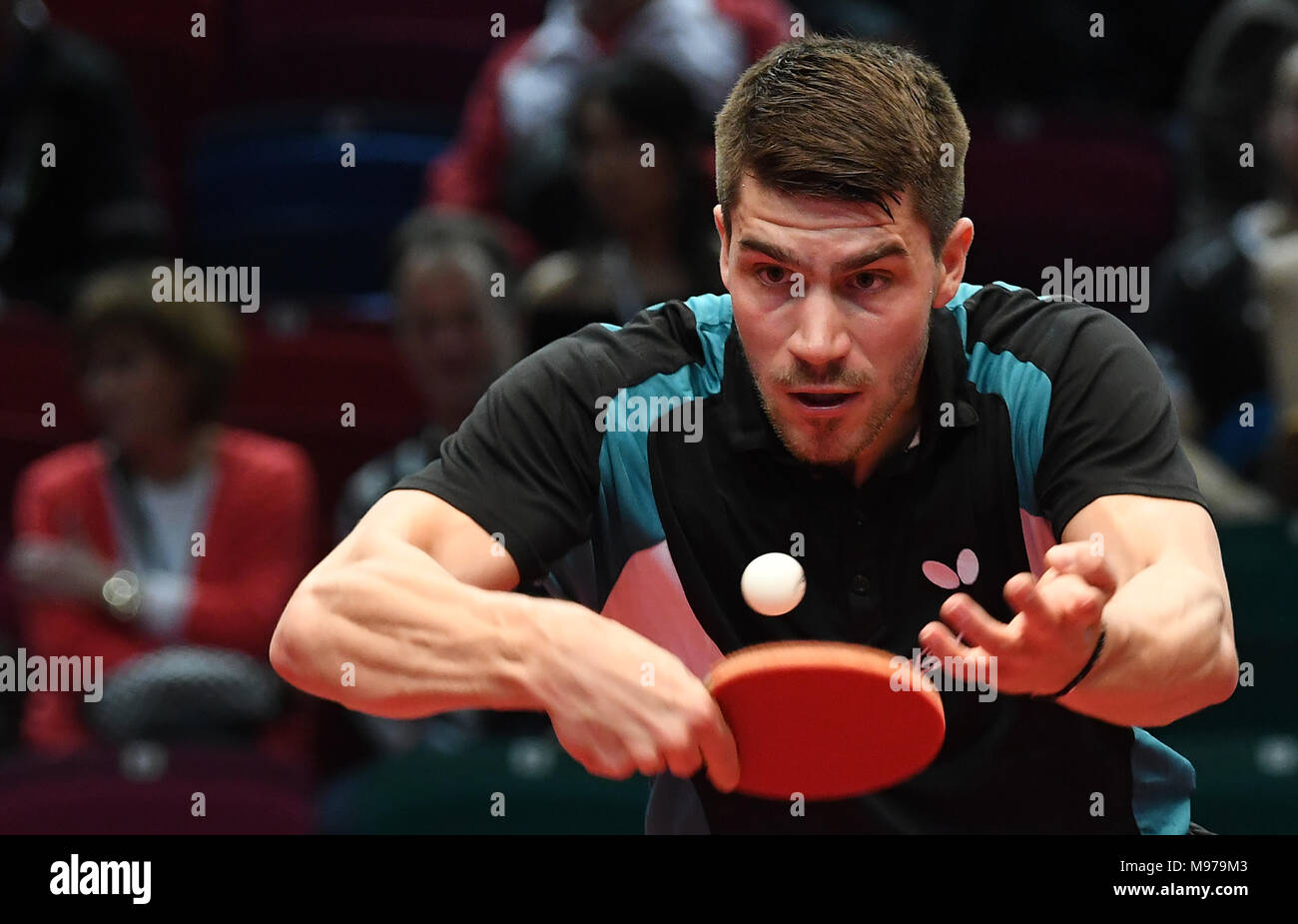 Bremen, Germany. 23rd Mar, 2018. 23 March 2018, Germany, Bremen: Table  tennis, German Open, first round: Patrick Franziska in action against D.  Ovtcharov of Germany. The number three in the world rankings