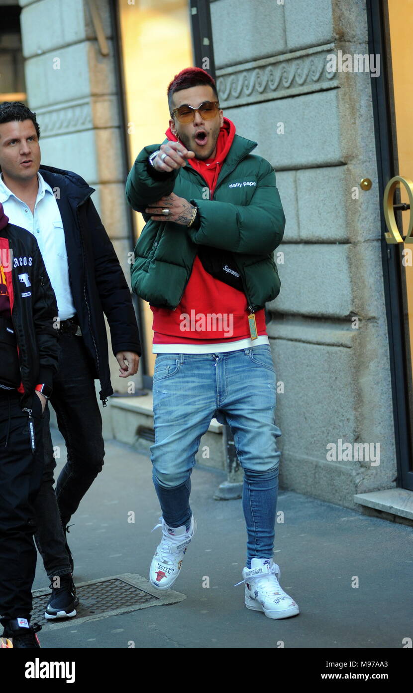 Milan, Sfera Ebbasta walks in the center The famous rapper SFERA EBBASTA  surprised to walk through the streets of the center. Here he is with  friends walking in Via Montenapoleone Stock Photo 