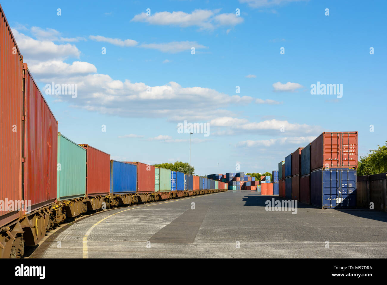 A train of containers parked in a shipping yard on the river Marne for the supply of supermarkets in Paris. Stock Photo