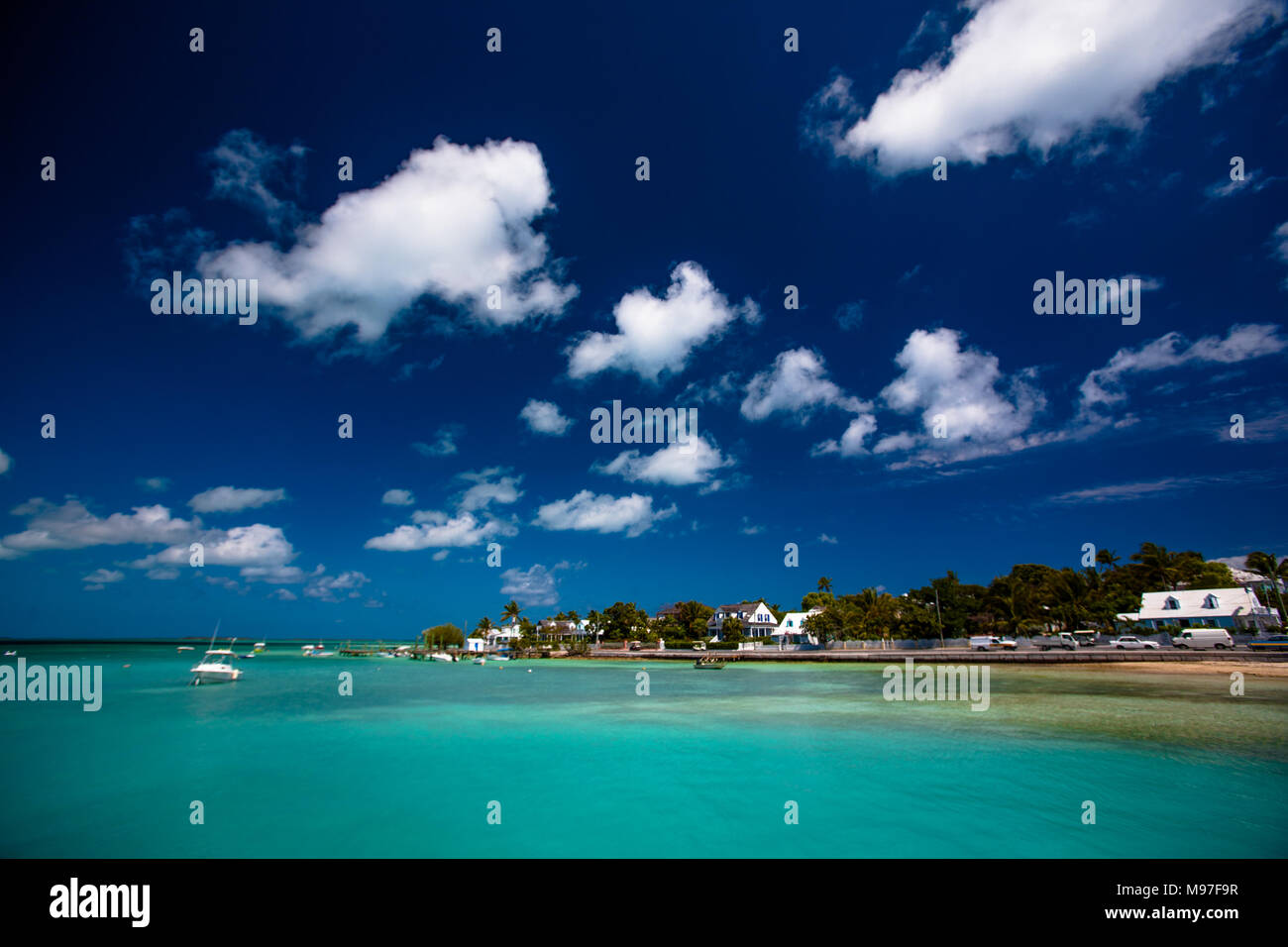 A beautiful bay on blue sky day with perfect clouds, Nassau, Bahamas Stock Photo